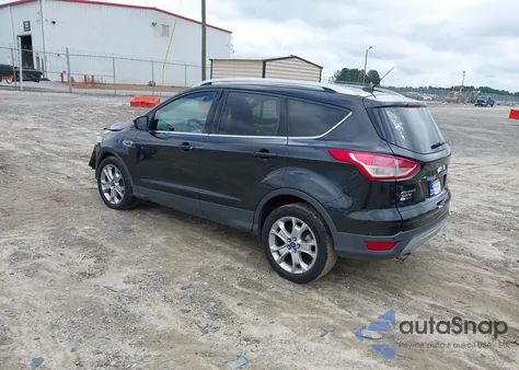 2014 Ford Escape Titanium z USA, uszkodzony, nr VIN 1FMCU9J92EUD26655
